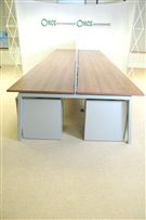 4800 x 1600 Bank of 6 bench desking in walnut complete with a 3 drawer silver under desk pedestal 